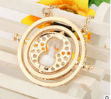 Gold plated time turner necklace