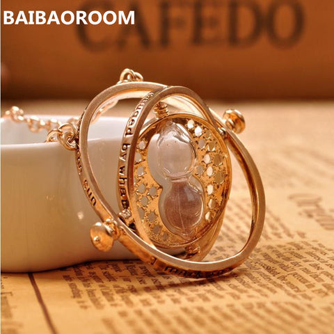 Gold plated time turner necklace